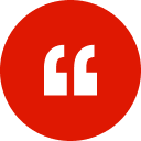 Red circle with white quotation marks inside.