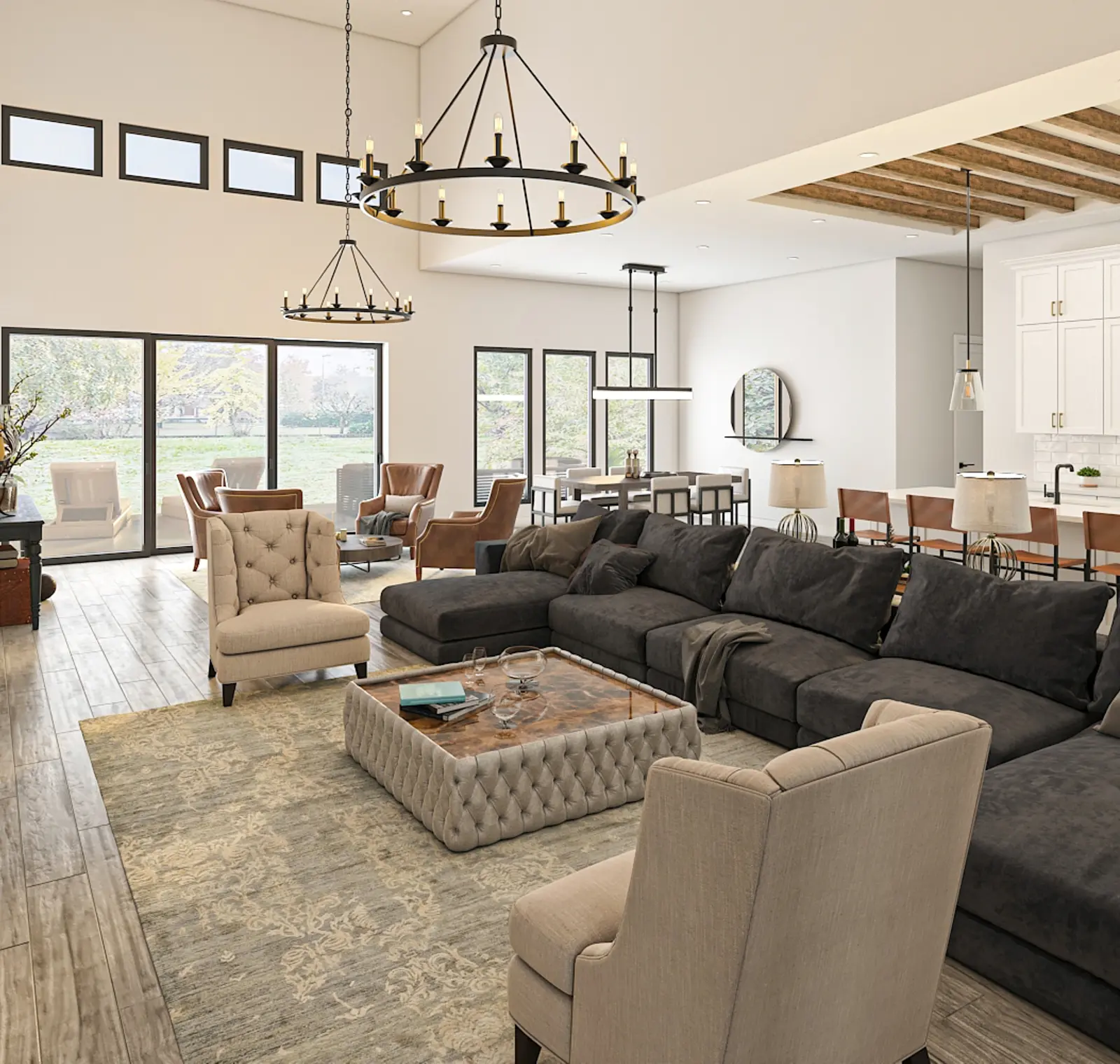 A spacious living room with a large gray sectional sofa and tufted chairs. A rustic chandelier hangs from the ceiling. The room features large windows and a view of an outdoor area.